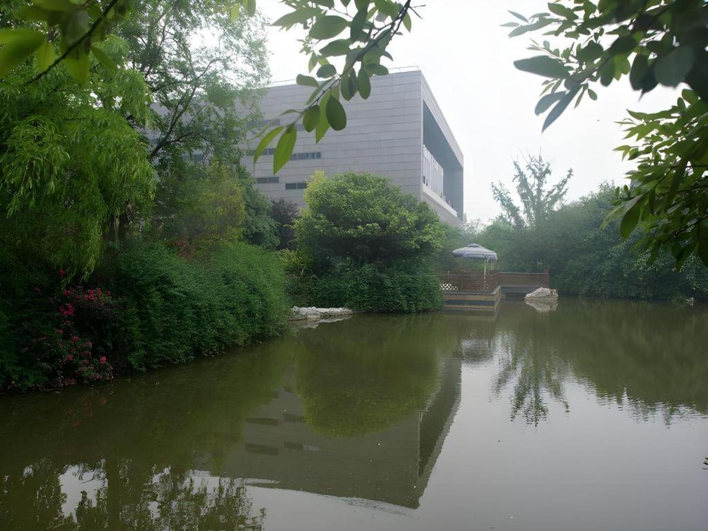 Sichuan Tennis International Hotel Main Building Чънду Екстериор снимка